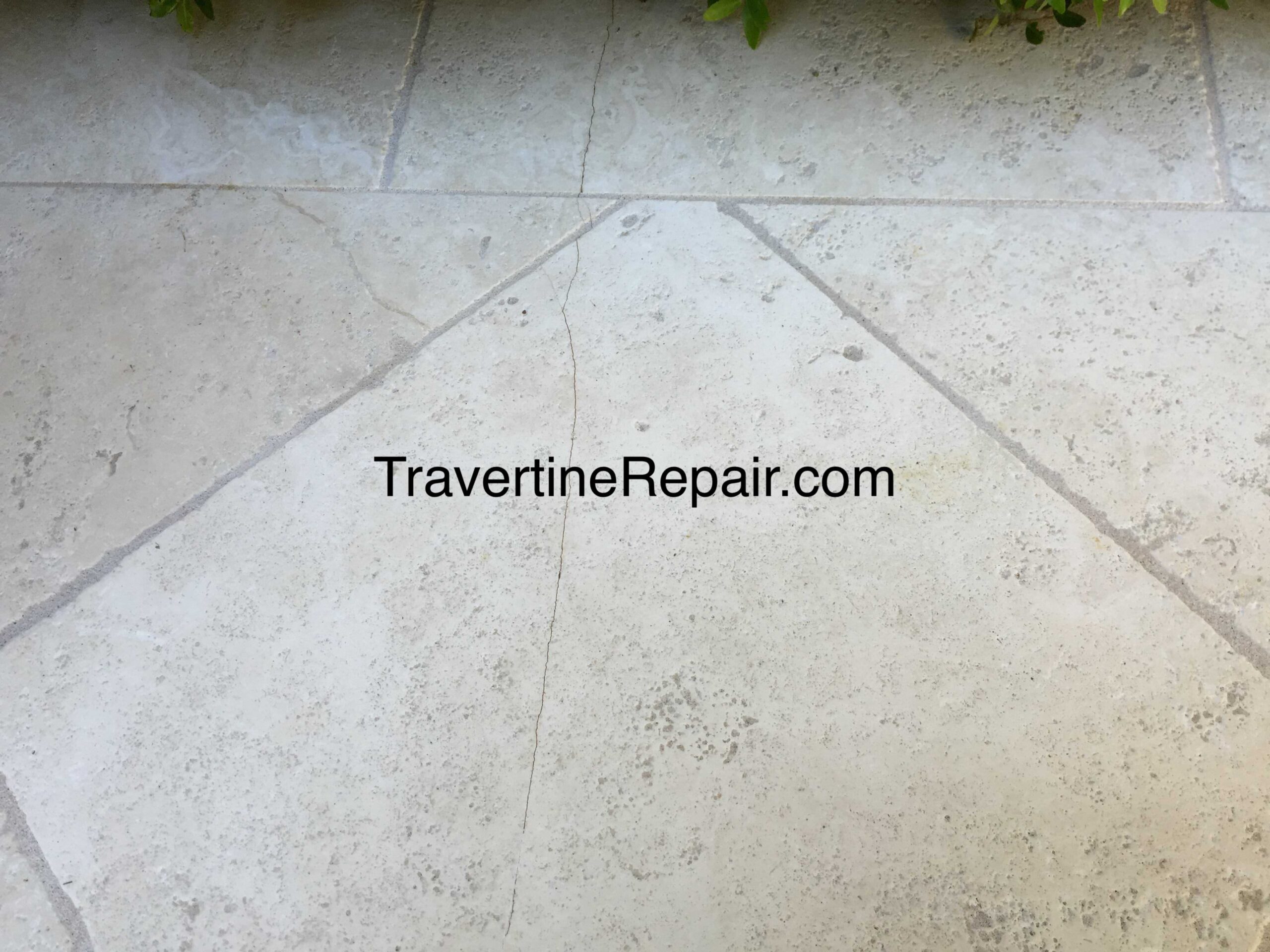 Travertine_Paver_Patio_Before_Tile-Crack_Repair