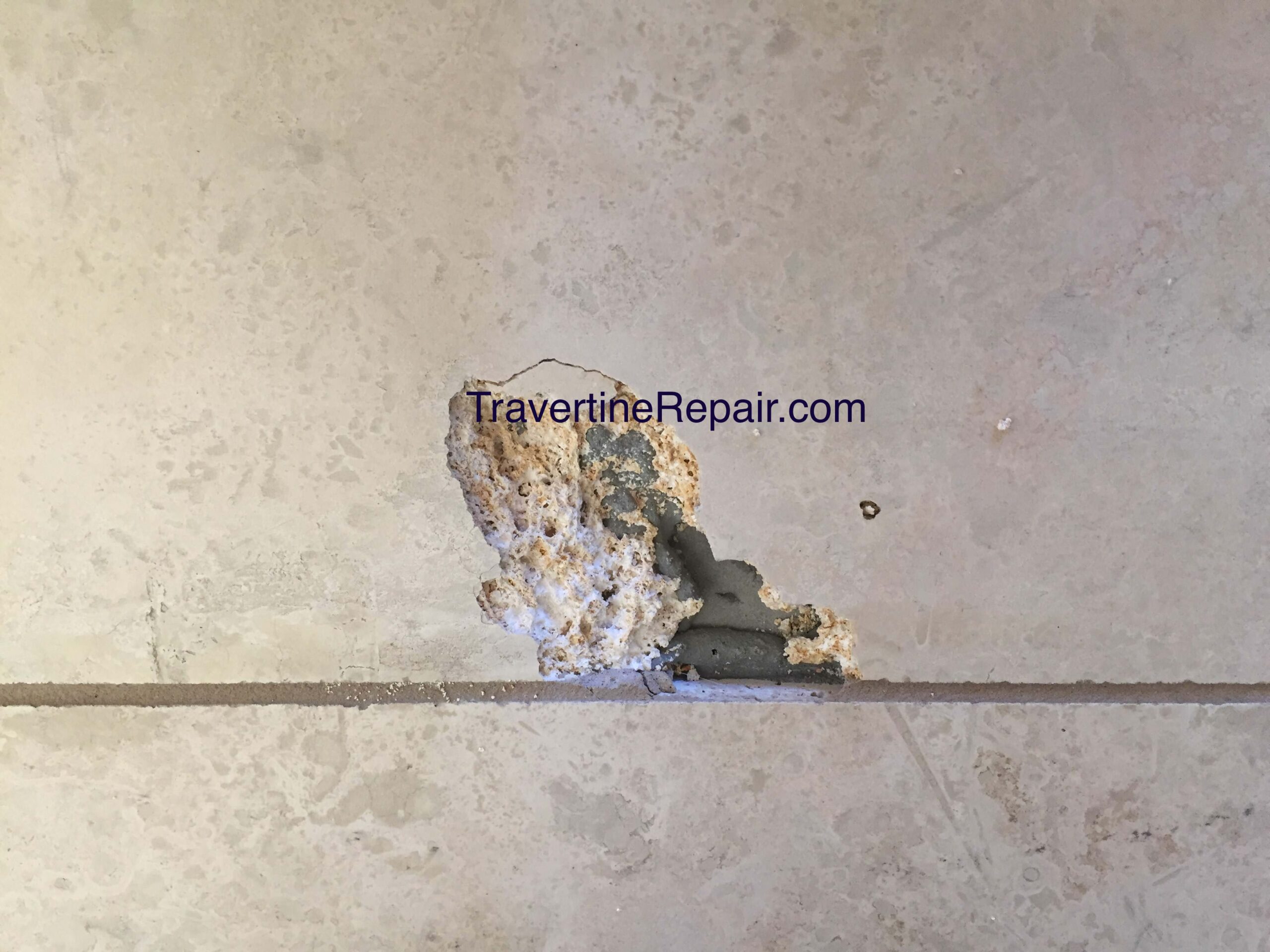 travertine holes before repairs